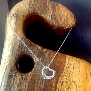 Tiffany open heart pendant and 16 inch chain.